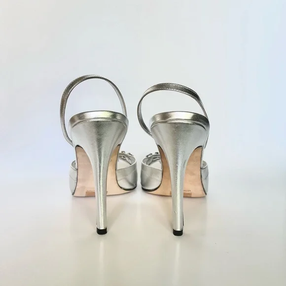 Silver sandals with rhinestones